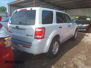 2009 Ford Escape Hybrid with VIN 1FMCU49399KC19803, listed as a IAAI auction lot 42004776 with 163,353 mi miles and . Bid and sale history available at DreamBid. Image 4.