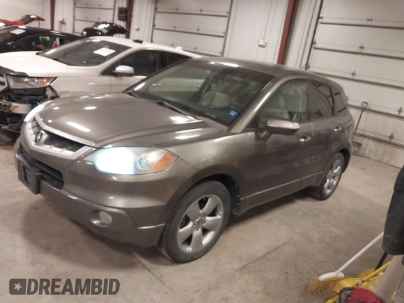 2008 Acura RDX with VIN 5J8TB18208A020341, listed as a IAAI auction lot 41525576 with 124,575 mi miles. Bid and sale history available at carsss.com. Image 2.