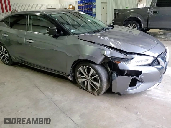 2020 Nissan Maxima SV z VIN 1N4AA6CVXLC369534, wystawiony jako Copart lot #55363295 z przebiegiem 98 438 mil mil oraz Szkoda całkowita • Salvage title. Historia ofert i sprzedaży dostępna na DreamBid. Obrazek 13.