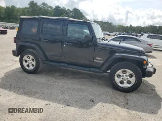 2013 Jeep Wrangler Unlimited Sahara with VIN 1C4HJWEG9DL701391, listed as a Copart auction lot 60492325 with 117,584 mi miles and Salvage title. Bid and sale history available at DreamBid. Image 4.