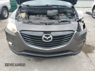 2015 Mazda CX-9 Grand Touring z VIN JM3TB2DA0F0468350, wystawiony jako Copart lot #61545095 z przebiegiem 154 050 mil mil oraz Szkoda całkowita • Salvage title. Historia ofert i sprzedaży dostępna na DreamBid. Obrazek 12.