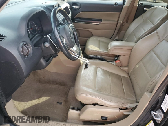 2011 Jeep Patriot Latitude X with VIN 1J4NF4GB4BD167258, listed as a Copart auction lot 52239874 with 157,144 mi miles and Salvage Title. Bid and sale history available at DreamBid. Image 7.