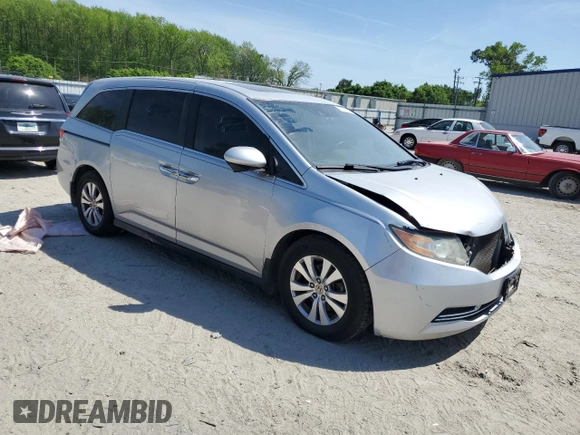 2015 Honda Odyssey EX-L with VIN 5FNRL5H66FB112090, listed as a Copart auction lot 52721475 with 120,472 mi miles and Salvage Title. Bid and sale history available at DreamBid. Image 4.