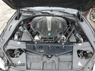 2014 BMW 6 Series 650i z VIN WBA6B2C5XED128959, wystawiony jako Copart lot #50816635 z przebiegiem 146 875 mil mil oraz Szkoda całkowita • Salvage title. Historia ofert i sprzedaży dostępna na DreamBid. Obrazek 11.