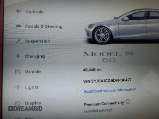 2013 Tesla Model S z VIN 5YJSA1CG9DFP06427, wystawiony jako Copart lot #59515845 z przebiegiem 49 446 mil mil oraz Szkoda całkowita • Salvage title. Historia ofert i sprzedaży dostępna na DreamBid. Obrazek 9.