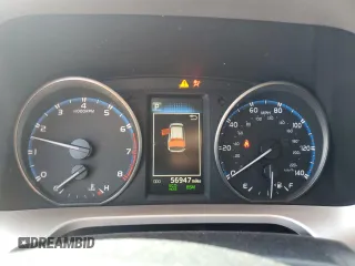 2018 Toyota RAV4 XLE with VIN JTMWFREV7JD119143, listed as a Copart auction lot 52576915 with 56,947 mi miles and Salvage Title. Bid and sale history available at carsss.com. Image 9.