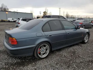 2000 BMW 5 Series 540i with VIN WBADN5342YGC93532, listed as a Copart auction lot 84562924 with 0 mi miles and Salvage Title. Bid and sale history available at carsss.com. Image 3.