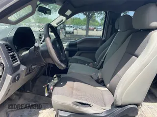 2019 Ford F-150 XL with VIN 1FTFX1E59KKE52570, listed as a IAAI auction lot 42082453 with 143,512 mi miles. Bid and sale history available at carsss.com. Image 1.