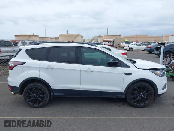 2018 Ford Escape SE with VIN 1FMCU0GD9JUA04709, listed as a IAAI auction lot 41831359 with 62,638 mi miles. Bid and sale history available at carsss.com. Image 13.