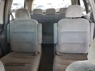 2001 Honda Odyssey EX z VIN 2HKRL18601H559033, wystawiony jako Copart lot #57119025 z przebiegiem 333 068 mil mil oraz Szkoda całkowita • Salvage title. Historia ofert i sprzedaży dostępna na DreamBid. Obrazek 10.