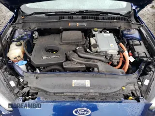 2016 Ford Fusion SE Hybrid with VIN 3FA6P0LU8GR343207, listed as a Copart auction lot 84234924 with 143,601 mi miles and Salvage title. Bid and sale history available at DreamBid. Image 11.