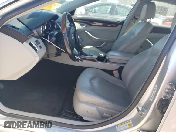 2012 Cadillac CTS Luxury with VIN 1G6DE5E52C0138229, listed as a Copart auction lot 49880475 with 143,315 mi miles and Clean title. Bid and sale history available at DreamBid. Image 7.