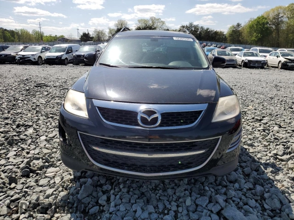 2011 Mazda CX-9 Grand Touring with VIN JM3TB2DA6B0304840, listed as a Copart auction lot 52394295 with 147,888 mi miles and Clean Title. Bid and sale history available at carsss.com. Image 5.