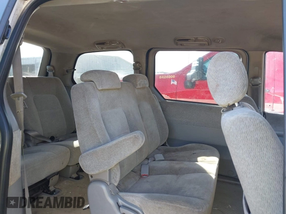 2005 Kia Sedona LX with VIN KNDUP132956703200, listed as a IAAI auction lot 41700159 with 125,578 mi miles. Bid and sale history available at carsss.com. Image 8.