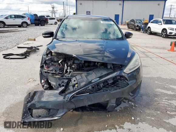 2015 Ford Focus SE with VIN 1FADP3F23FL242768, listed as a Copart auction lot 58068865 with 172,163 mi miles and Salvage title. Bid and sale history available at DreamBid. Image 5.
