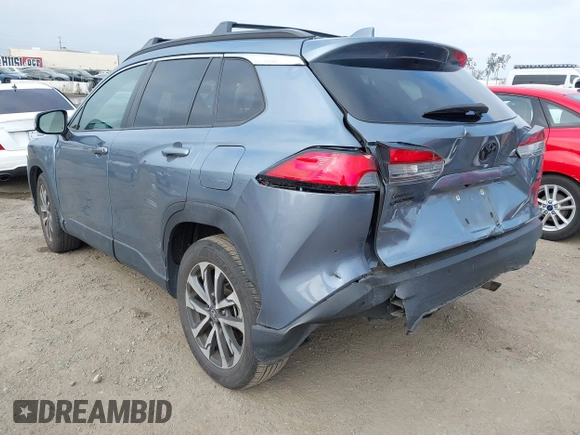 2022 Toyota Corolla Cross XLE with VIN 7MUDAABG6NV007009, listed as a IAAI auction lot 42409061 with 37,178 mi miles and . Bid and sale history available at DreamBid. Image 3.