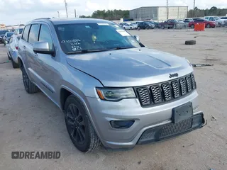 2020 Jeep Grand Cherokee Altitude with VIN 1C4RJEAGXLC403693, listed as a IAAI auction lot 41482425 with 67,161 mi miles and . Bid and sale history available at DreamBid. Image 1.