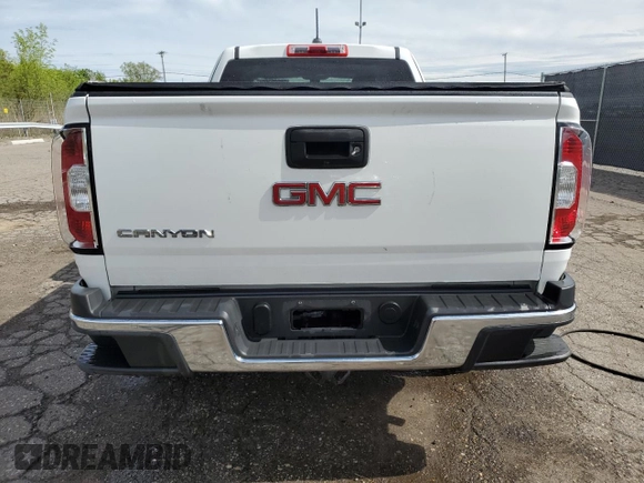 2015 GMC Canyon z VIN 1GTH6AEA7F1163952, wystawiony jako Copart lot #56680505 z przebiegiem 123 025 mil mil oraz Czysty tytuł • Clean title. Historia ofert i sprzedaży dostępna na DreamBid. Obrazek 6.