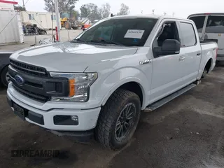 2019 Ford F-150 XL with VIN 1FTEW1CPXKKC50999, listed as a IAAI auction lot 41862139 with 61,375 mi miles and . Bid and sale history available at DreamBid. Image 22.