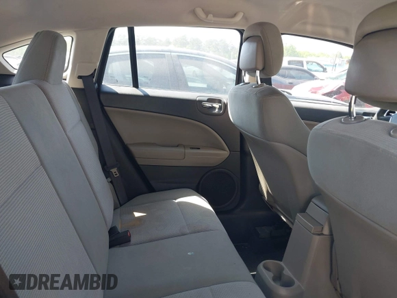 2011 Dodge Caliber Mainstreet with VIN 1B3CB3HAXBD107494, listed as a IAAI auction lot 42071328 with 146,936 mi miles. Bid and sale history available at carsss.com. Image 8.