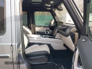 2023 Mercedes-Benz G 550 with VIN W1NYC6BJ4PX486695, listed as a IAAI auction lot 41638507 with 8,678 mi miles and . Bid and sale history available at DreamBid. Image 5.