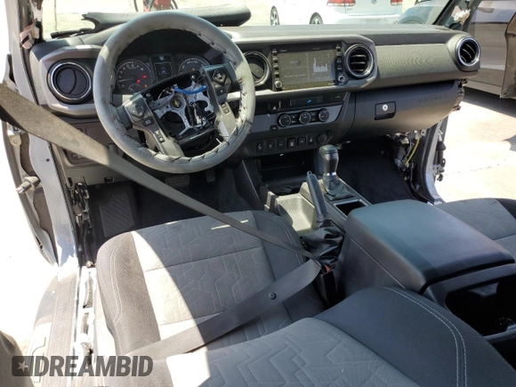 2021 Toyota Tacoma SR5 with VIN 3TMBZ5DNXMM031339, listed as a Copart auction lot 59178515 with 27,885 mi miles and Salvage title. Bid and sale history available at DreamBid. Image 8.