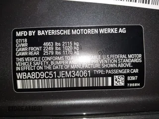 2018 BMW 3 Series 330i xDrive with VIN WBA8D9C51JEM34061, listed as a IAAI auction lot 42682318 with 65,245 mi miles and . Bid and sale history available at DreamBid. Image 9.
