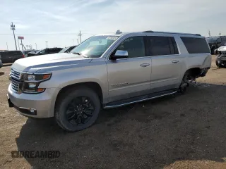 2017 Chevrolet Suburban Premier with VIN 1GNSKJKC1HR340921, listed as a Copart auction lot 59186045 with 132,781 mi miles and Salvage title. Bid and sale history available at DreamBid. Image 1.