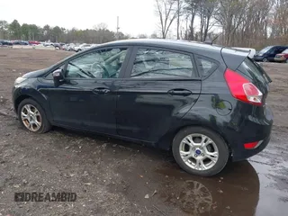 2015 Ford Fiesta SE with VIN 3FADP4EJ9FM175123, listed as a IAAI auction lot 41948452 with 130,801 mi miles. Bid and sale history available at carsss.com. Image 3.
