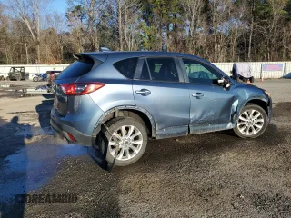 2015 Mazda CX-5 Grand Touring with VIN JM3KE2DY9F0483509, listed as a Copart auction lot 87406944 with 176,213 mi miles and Salvage Title. Bid and sale history available at carsss.com. Image 3.