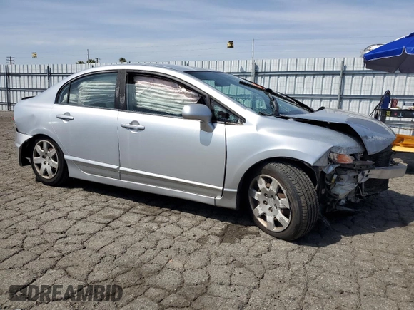 2010 Honda Civic LX with VIN 2HGFA1F57AH586100, listed as a Copart auction lot 50066965 with 192,401 mi miles and Salvage Title. Bid and sale history available at DreamBid. Image 4.