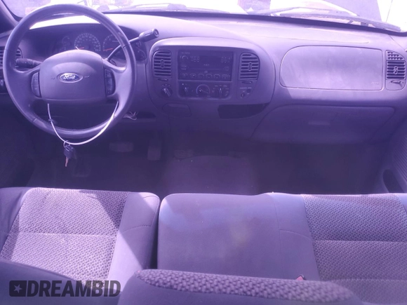 2004 Ford F-150 XL with VIN 2FTRF18W14CA74904, listed as a Copart auction lot 50361935 with 163,684 mi miles and Salvage title. Bid and sale history available at DreamBid. Image 8.