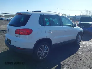 2013 Volkswagen Tiguan SE with VIN WVGBV7AX7DW511699, listed as a IAAI auction lot 41970908 with 164,758 mi miles and . Bid and sale history available at DreamBid. Image 4.