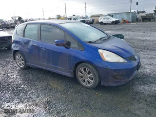 2009 Honda Fit Sport w/Navi with VIN JHMGE88699S023851, listed as a IAAI auction lot 41507521 with 206,417 mi miles. Bid and sale history available at carsss.com. Image 1.