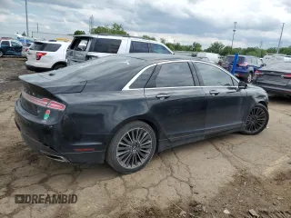 2014 Lincoln MKZ z VIN 3LN6L2GK5ER826026, wystawiony jako Copart lot #58941095 z przebiegiem 130 761 mil mil oraz Czysty tytuł • Clean title. Historia ofert i sprzedaży dostępna na DreamBid. Obrazek 3.