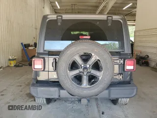 2020 Jeep Wrangler Unlimited Sport Altitude with VIN 1C4HJXDN9LW154318, listed as a Copart auction lot 56473335 with 99,482 mi miles and Salvage title. Bid and sale history available at DreamBid. Image 6.