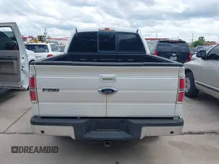 2011 Ford F-150 XLT with VIN 1FTFW1CT7BFA59275, listed as a IAAI auction lot 42111709 with 203,718 mi miles. Bid and sale history available at carsss.com. Image 16.