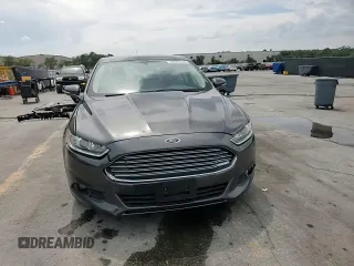 2015 Ford Fusion SE Hybrid with VIN 3FA6P0LUXFR220930, listed as a Copart auction lot 58407235 with 179,682 mi miles and Salvage title. Bid and sale history available at DreamBid. Image 14.
