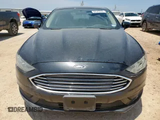 2018 Ford Fusion SE z VIN 3FA6P0HD5JR252718, wystawiony jako Copart lot #60549335 z przebiegiem 120 807 mil mil oraz Czysty tytuł • Clean title. Historia ofert i sprzedaży dostępna na DreamBid. Obrazek 5.