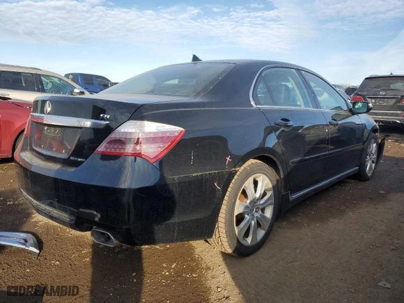 2009 Acura RL Tech Pkg with VIN JH4KB26659C000306, listed as a Copart auction lot 41802015 with 127,831 mi miles and Salvage Title. Bid and sale history available at carsss.com. Image 3.