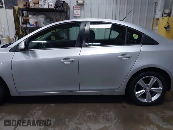 2014 Chevrolet Cruze 2LT z VIN 1G1PE5SB4E7393620, wystawiony jako IAAI lot #42056437 z przebiegiem 173 687 mil mil oraz . Historia ofert i sprzedaży dostępna na DreamBid. Obrazek 14.