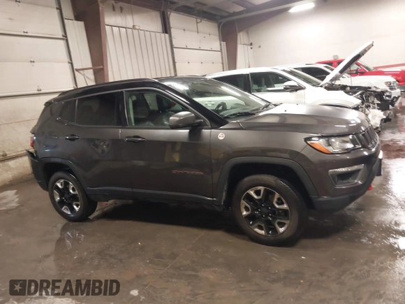 2018 Jeep Compass Trailhawk with VIN 3C4NJDDB4JT210451, listed as a IAAI auction lot 41239258 with 90,552 mi miles and . Bid and sale history available at carsss.com. Image 13.