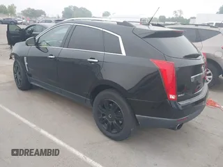 2011 Cadillac SRX Luxury Collection with VIN 3GYFNAEY2BS555800, listed as a IAAI auction lot 42118889 with 172,614 mi miles and . Bid and sale history available at carsss.com. Image 3.