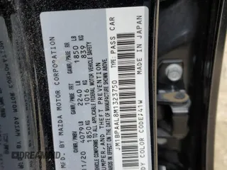 2021 Mazda 3 S z VIN JM1BPAAL8M1323750, wystawiony jako Copart lot #60162145 z przebiegiem 53 235 mil mil oraz Szkoda całkowita • Salvage title. Historia ofert i sprzedaży dostępna na DreamBid. Obrazek 12.