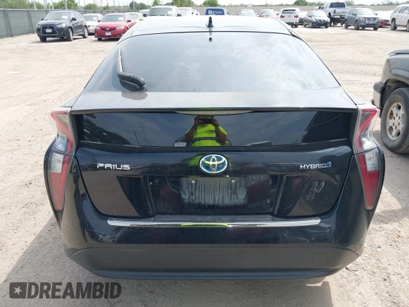 2016 Toyota Prius Two z VIN JTDKBRFU4G3509129, wystawiony jako IAAI lot #42321562 z przebiegiem 246 582 mil mil oraz . Historia ofert i sprzedaży dostępna na DreamBid. Obrazek 16.