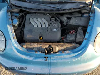 2004 Volkswagen New Beetle Coupe Satellite Blue with VIN 3VWGK31CX4M419900, listed as a Copart auction lot 41627155 with 129,510 mi miles and Salvage Title. Bid and sale history available at carsss.com. Image 12.