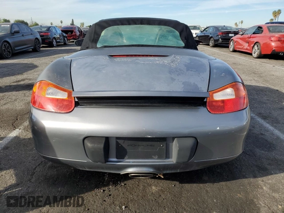 2002 Porsche Boxster z VIN WP0CA29862U621821, wystawiony jako Copart lot #85770484 z przebiegiem 121 843 mil mil oraz Czysty tytuł • Clean title. Historia ofert i sprzedaży dostępna na DreamBid. Obrazek 6.