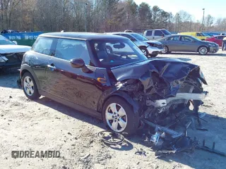 2014 MINI Hardtop with VIN WMWXM5C51ET972099, listed as a IAAI auction lot 41595497 with 113,496 mi miles and . Bid and sale history available at DreamBid. Image 1.