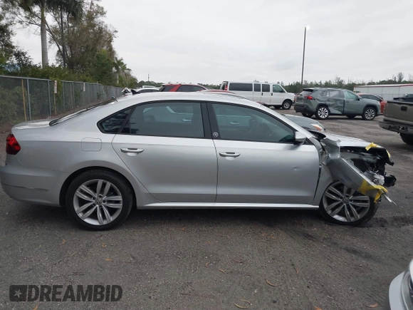 2019 Volkswagen Passat 2.0T Wolfsburg Edition with VIN 1VWLA7A3XKC007385, listed as a IAAI auction lot 41409014 with 36,208 mi miles. Bid and sale history available at carsss.com. Image 13.