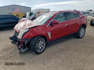 2014 Cadillac SRX Premium Collection z VIN 3GYFNGE39ES546393, wystawiony jako Copart lot #57261145 z przebiegiem 84 258 mil mil oraz Szkody całkowita. Historia ofert i sprzedaży dostępna na DreamBid. Obrazek 1.